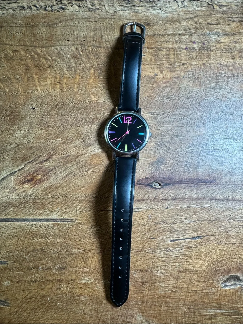 Pride Watch - unbranded watch with neon features on a black face w black strap